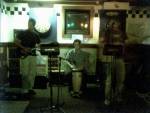 Looks like B is showing his 'O' face, even though it's blurry